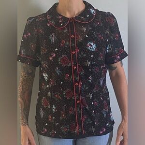 Cute shear rockabilly blouse worn a few times.